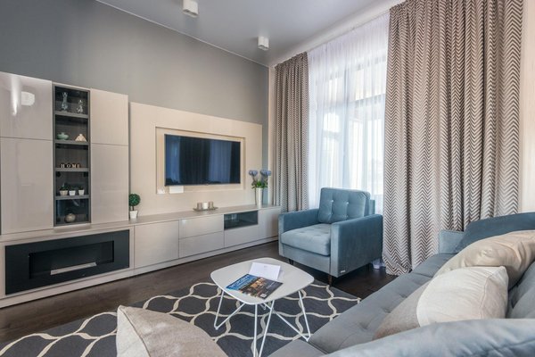 How are UK automakers integrating renewable energy into production processes?